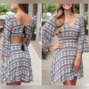 Blush Boutique black and white backless tassel dress size small